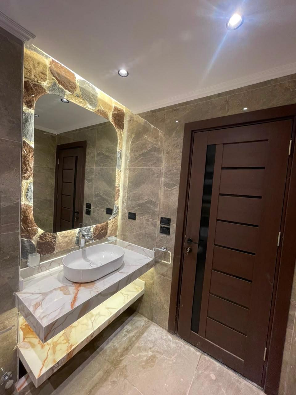 Bright Interiors finishing work: bathroom onyx vanity