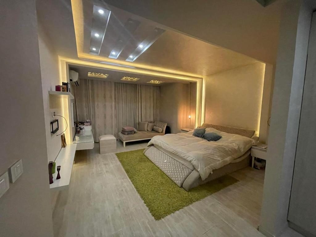 Bright Interiors finishing work: bedroom ceiling