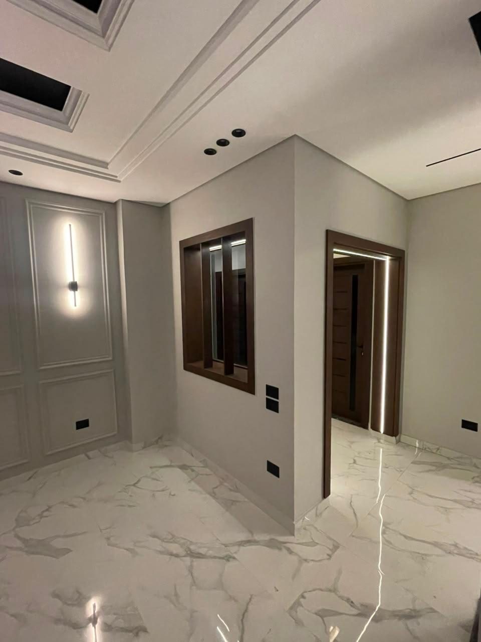 Bright Interiors finishing work: hall wall panels