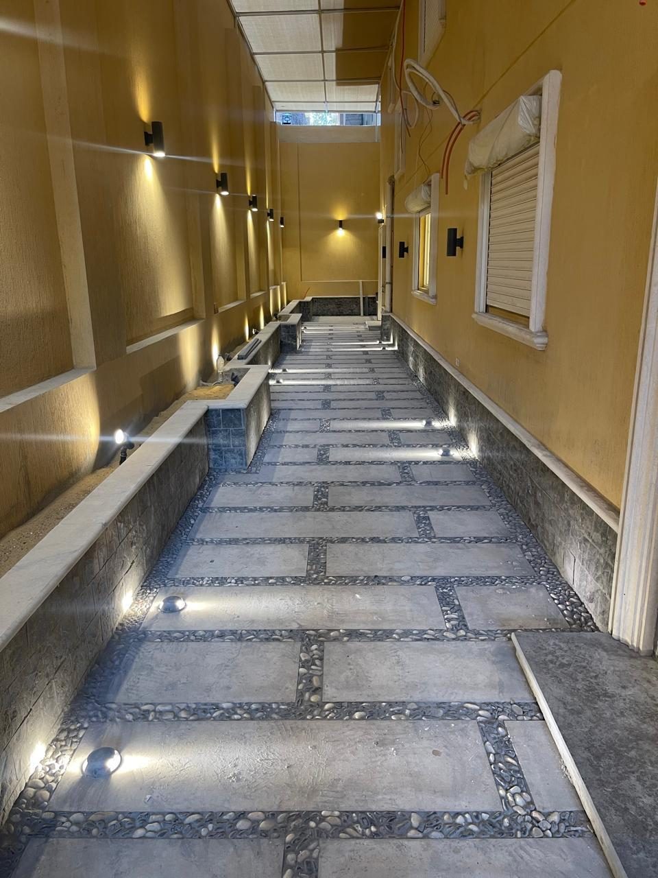 Bright Interiors finishing work: outdoor walkway lighting