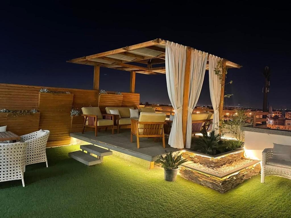 Bright Interiors finishing work: roof garden pergola