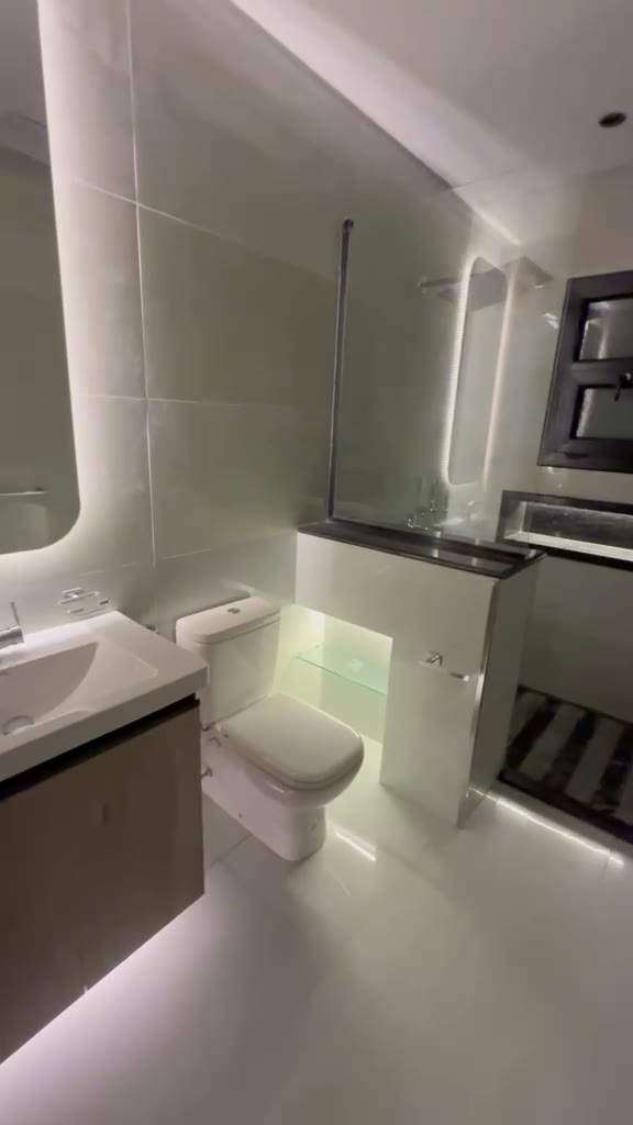 Finished bathroom with vanity and glass shower – Bright Interiors villa renovation