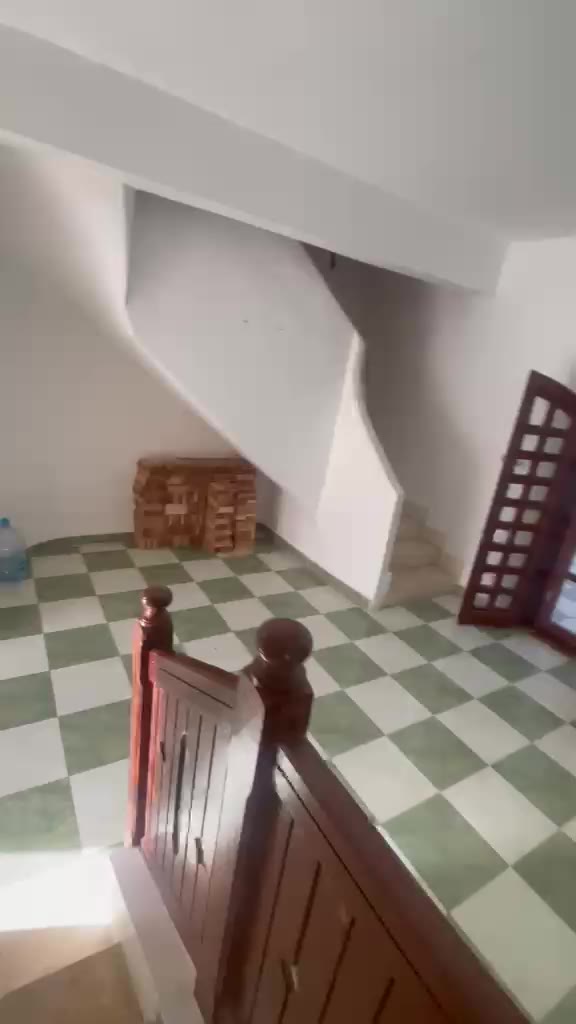Old staircase and floor tiles before renovation